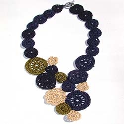 navy, green and off-white crochet necklace